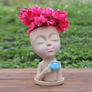 Vaso de Flores com Rosto de Menina