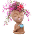 Vaso de Flores com Rosto de Menina